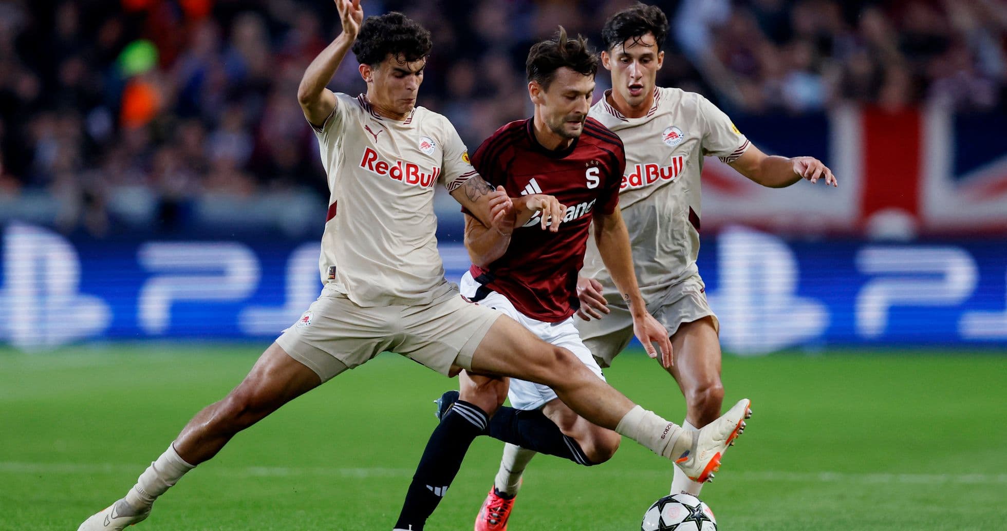 Two players contesting the ball during match