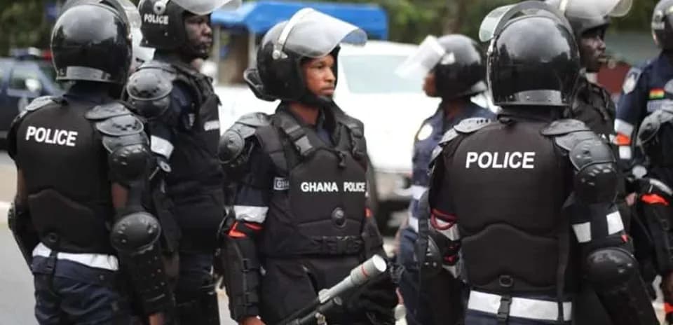Group of Ghana police officers in riot gear