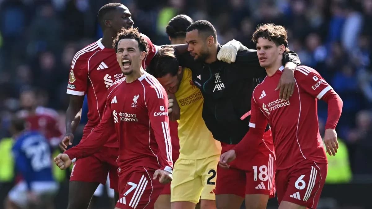 Liverpool players celebrating after a match victory