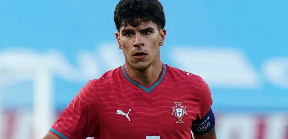 Player in red Portugal jersey during match