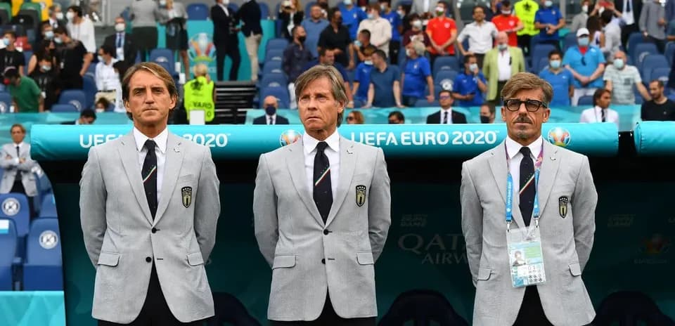 Coaching staff standing on the sidelines at UEFA Euro 2020