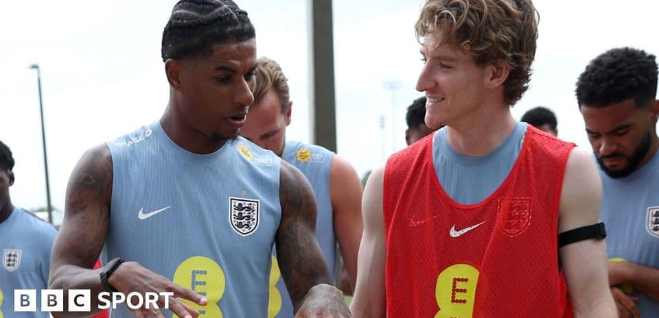 Players chatting during England training session