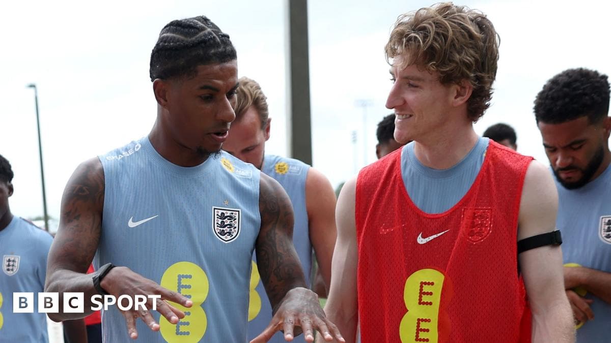 Players chatting during England training session