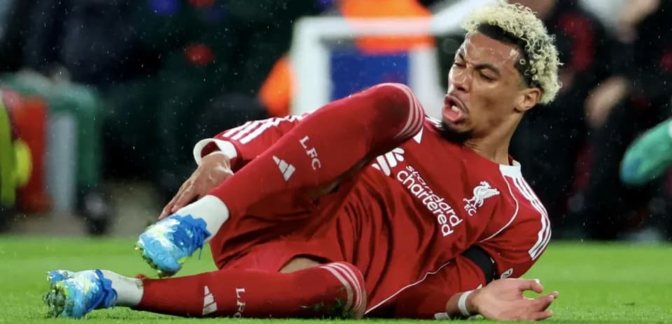 Liverpool player on the ground after falling