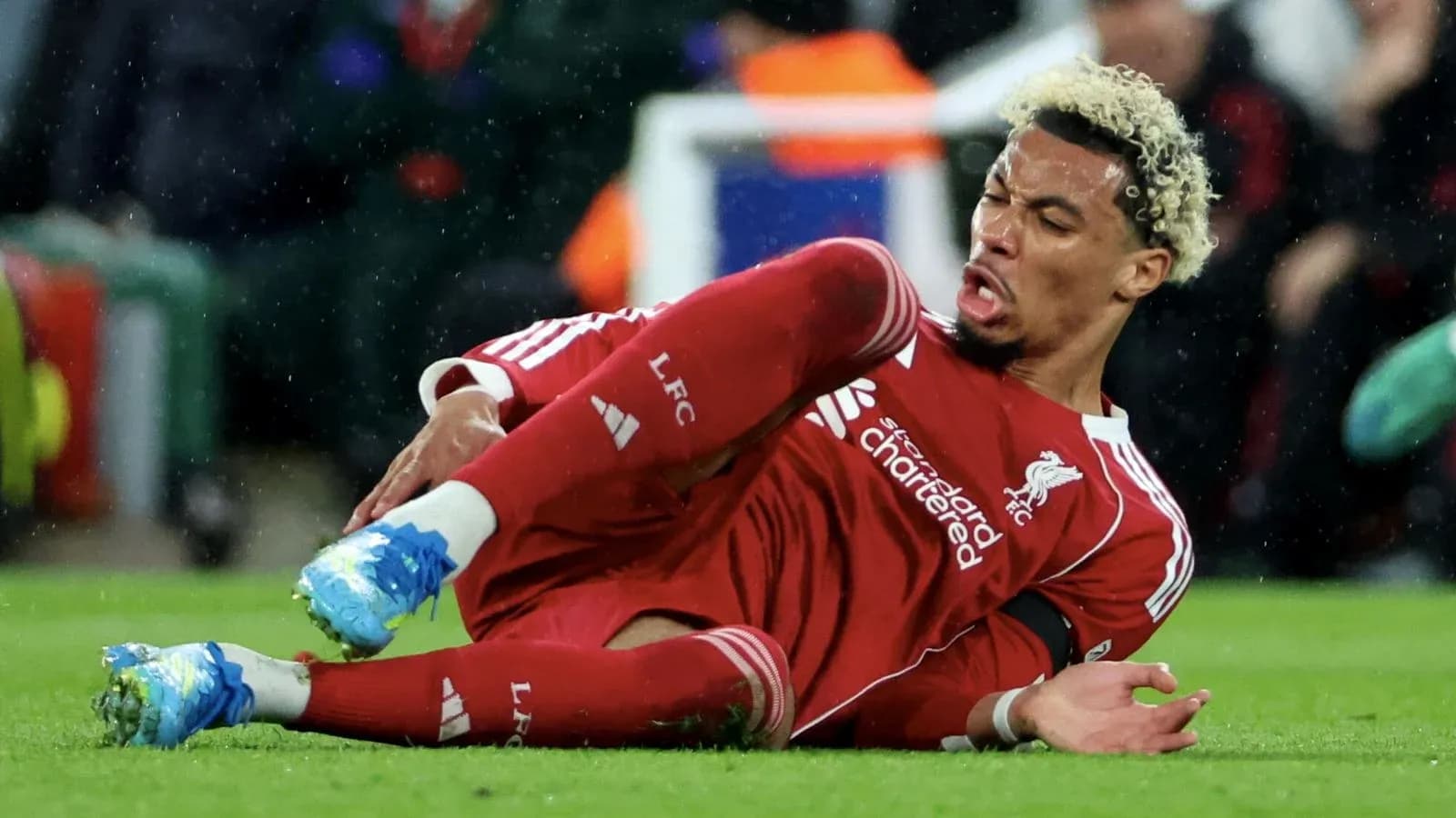 Liverpool player on the ground after falling