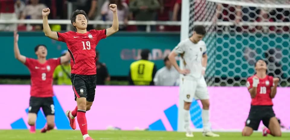 South Korea players celebrating a goal in match