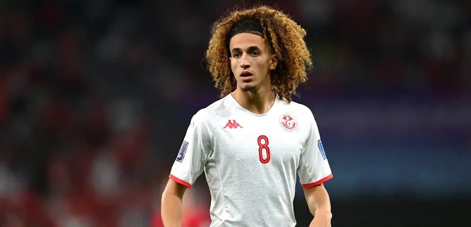 Player wearing Tunisia jersey during a match