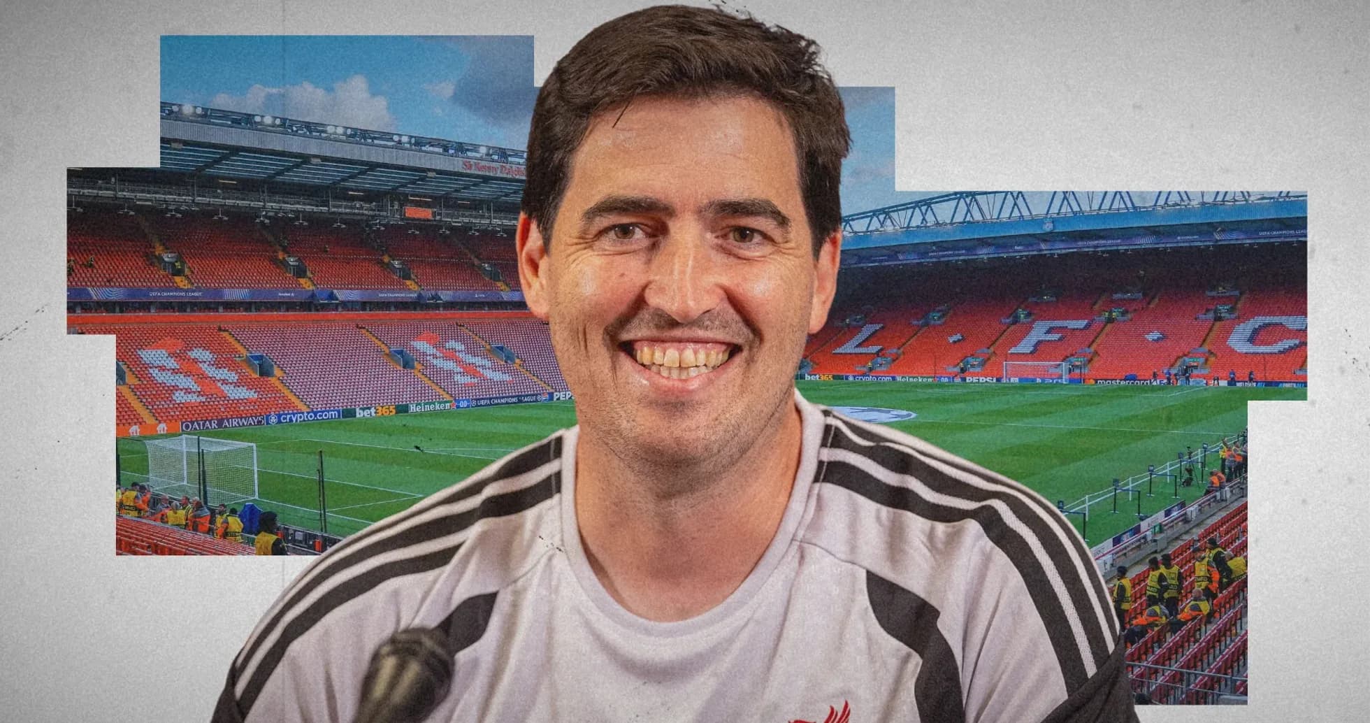 Coach smiling in front of Anfield stadium backdrop