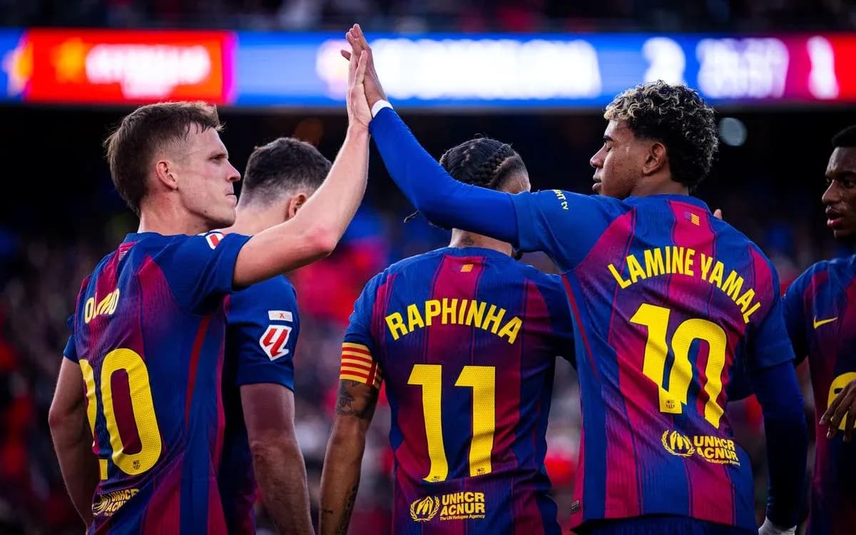 Barcelona players celebrating a goal during match
