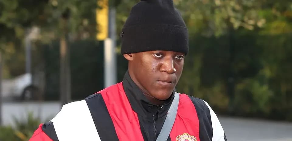 Player arriving at training in Manchester United attire