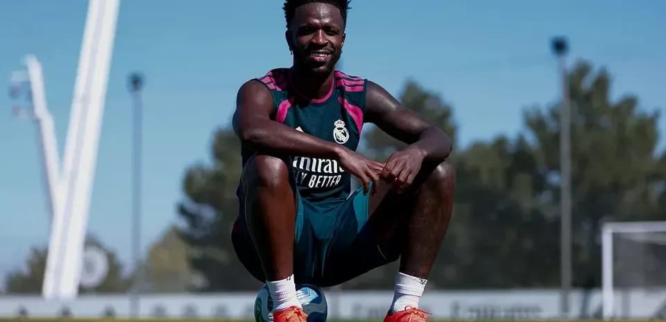 Player sitting on a ball during training session