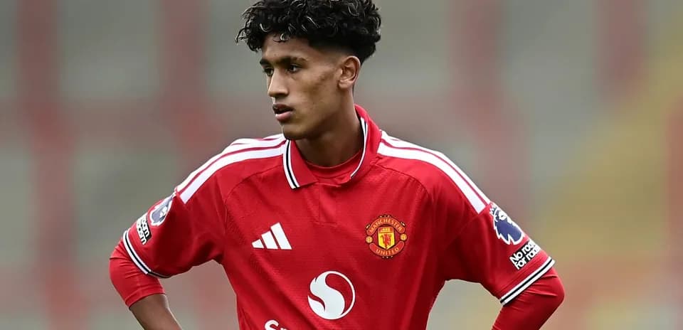 Young player in Manchester United jersey during match