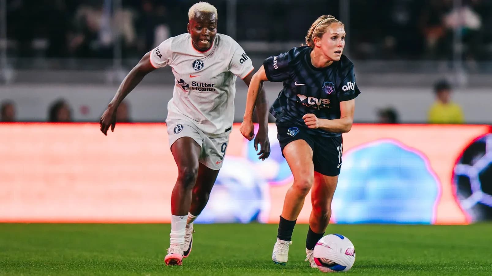 Bay FC players in action during match