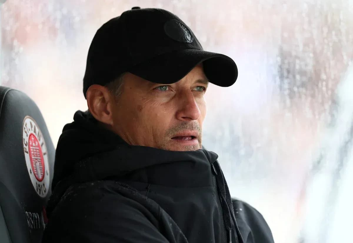 Coach observing the match from the sidelines