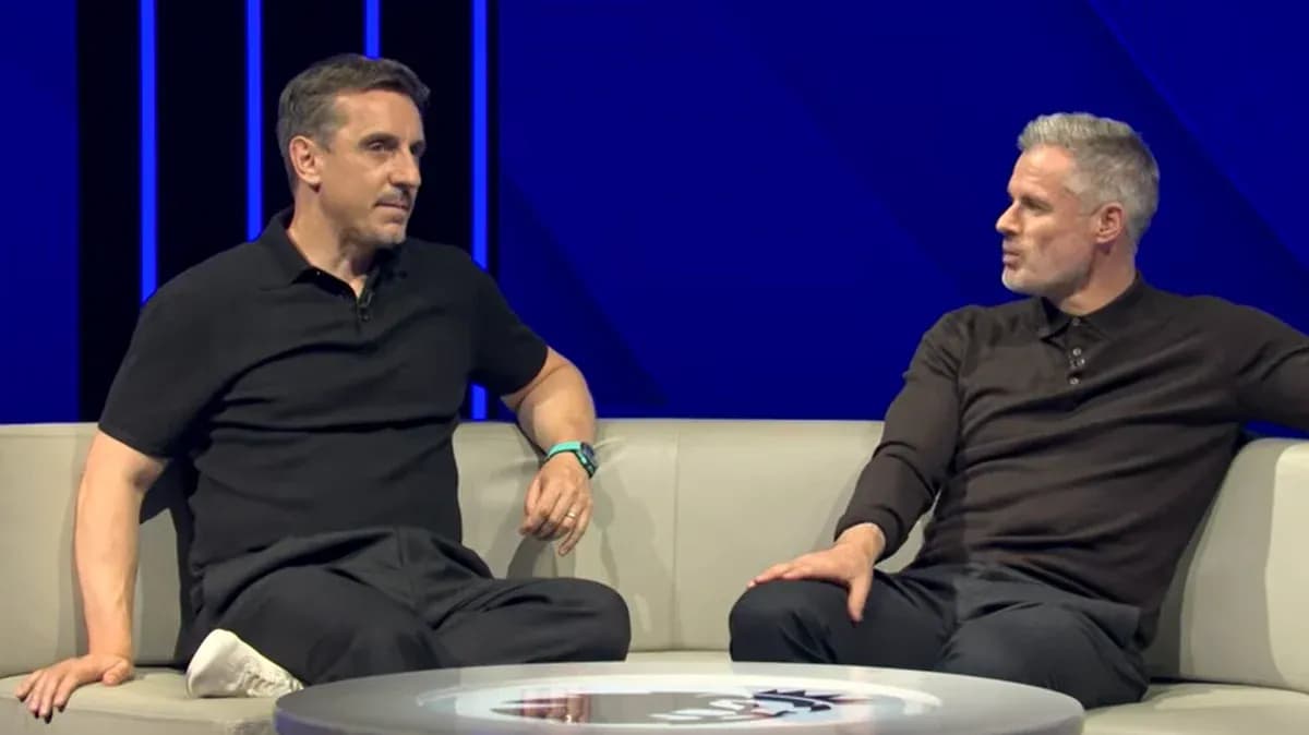 Two pundits discussing on a television set