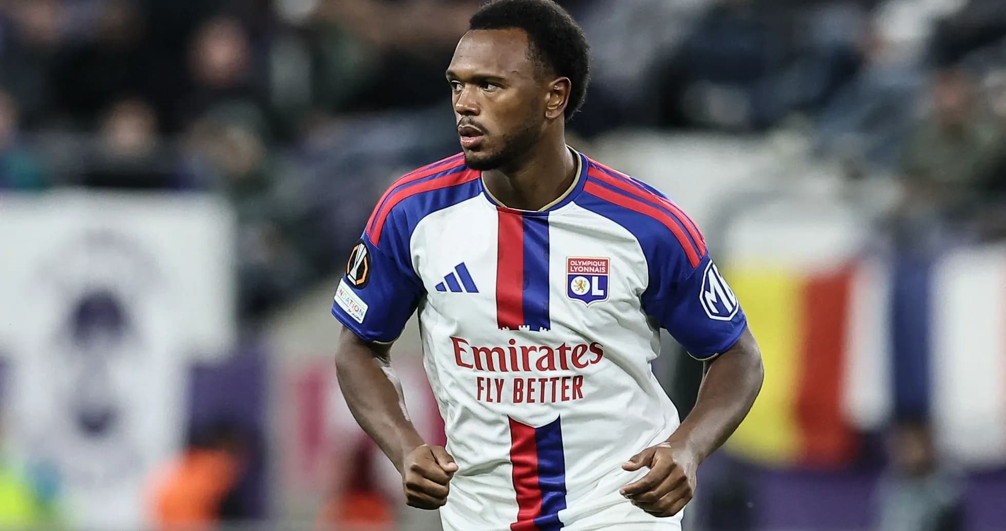 Player from Olympique Lyonnais running on the field