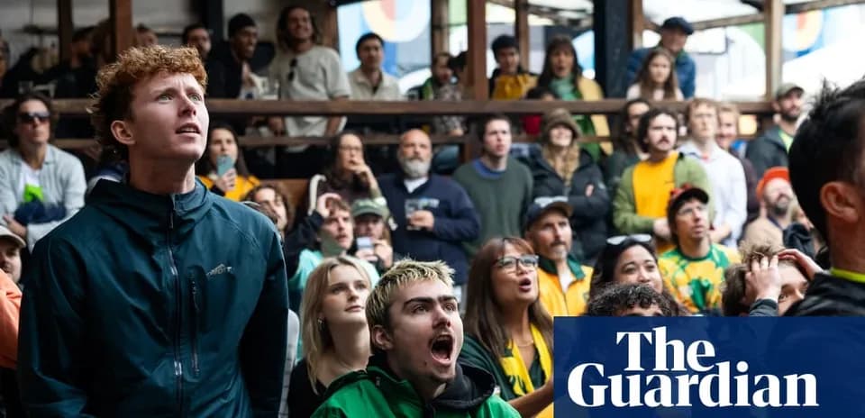 Crowd of fans watching a sports event together