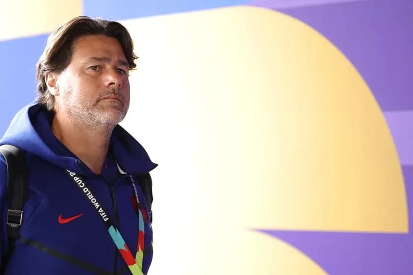 Coach entering venue with FIFA World Cup credentials