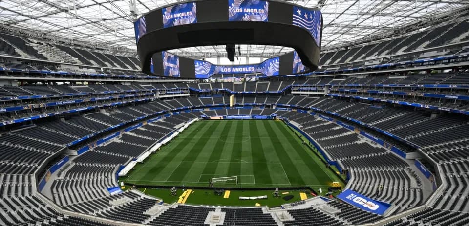 Interior view of stadium with empty seating and field