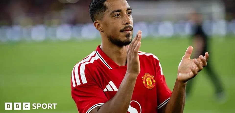 Player applauding fans after the match