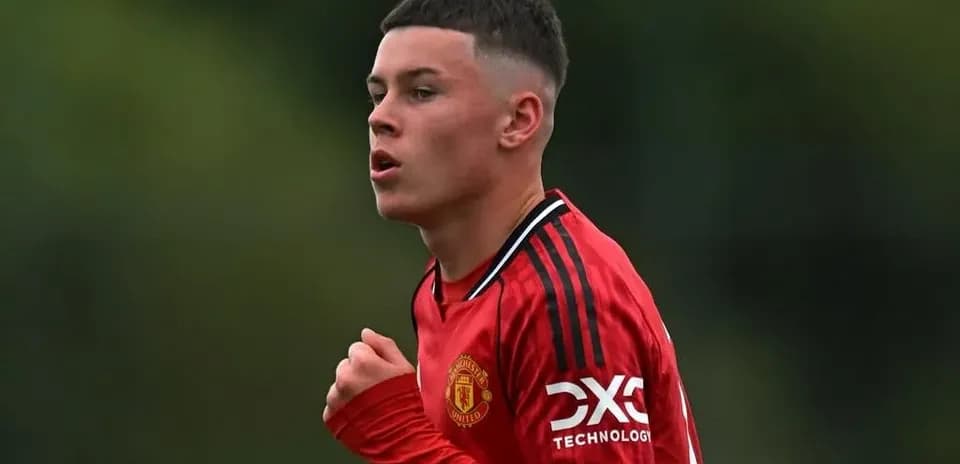 Young player in red jersey during training session