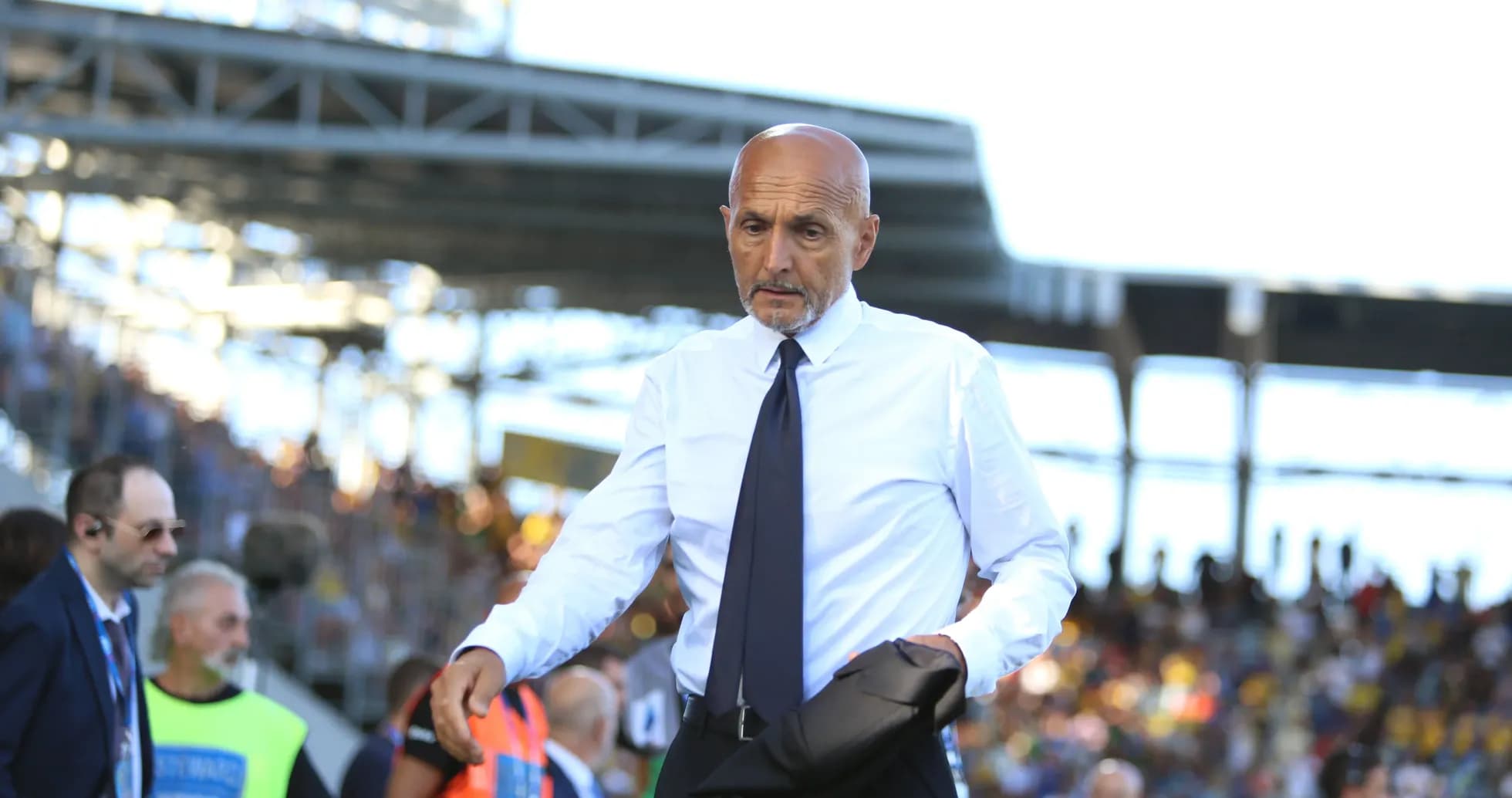Coach walking on the sideline during a match