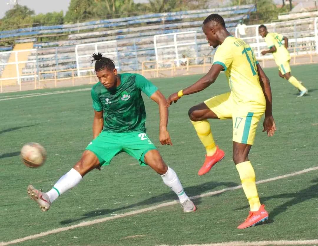 Players competing for the ball during NPFL match