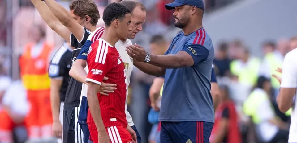 Player receiving guidance from coach during match