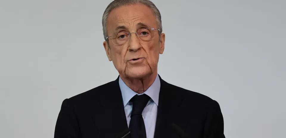 Man speaking at podium during press conference