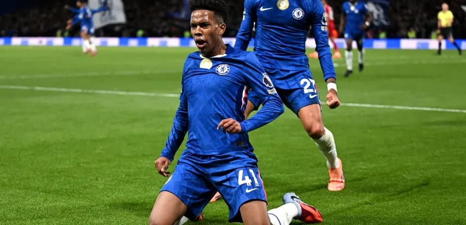Chelsea player celebrating goal against Liverpool