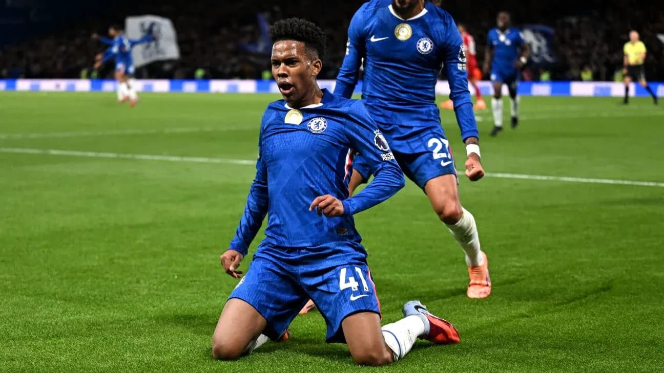 Chelsea player celebrating goal against Liverpool