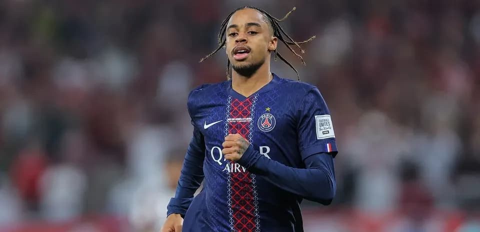 Player running in Paris Saint-Germain jersey during match