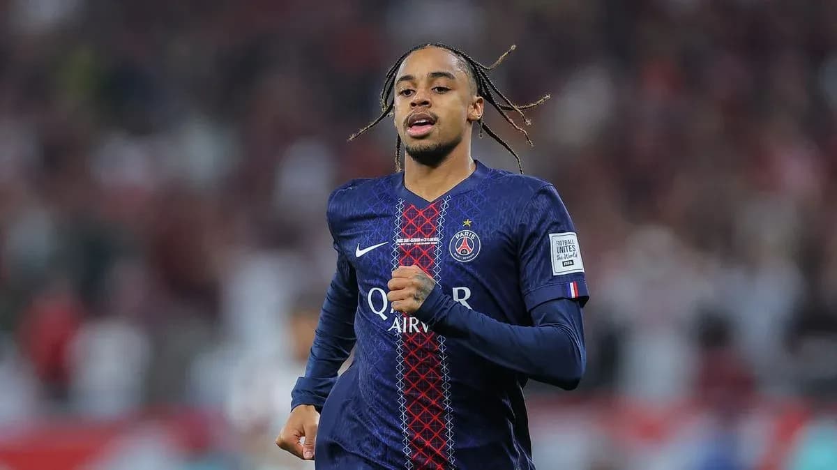 Player running in Paris Saint-Germain jersey during match