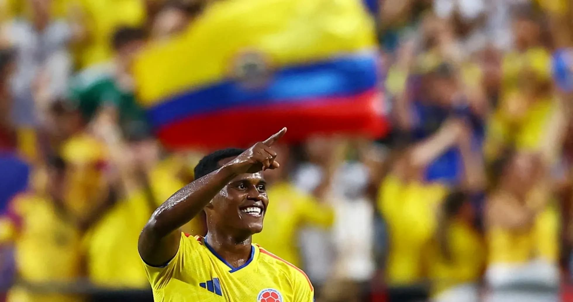 Player celebrating with fans during match
