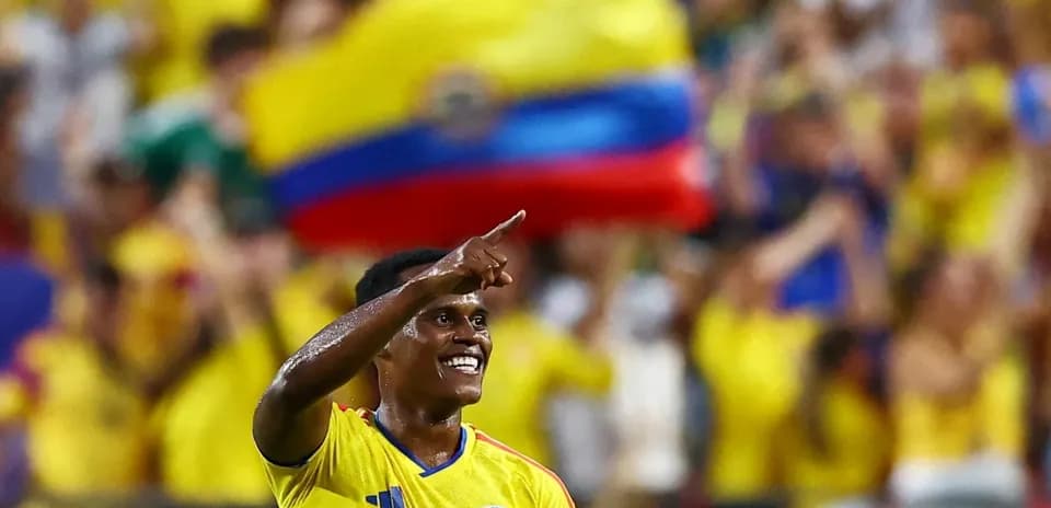 Player celebrating with fans during match