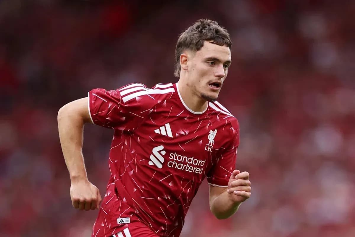 Player running during match in Liverpool kit