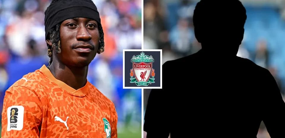 Goalkeeper in orange kit with Liverpool logo