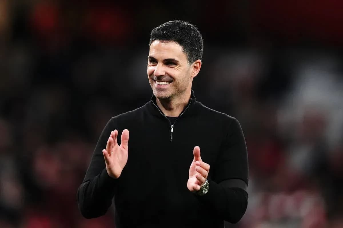 Manager applauding during a match at the stadium