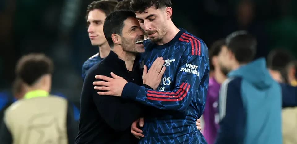 Manager and player celebrating after the match