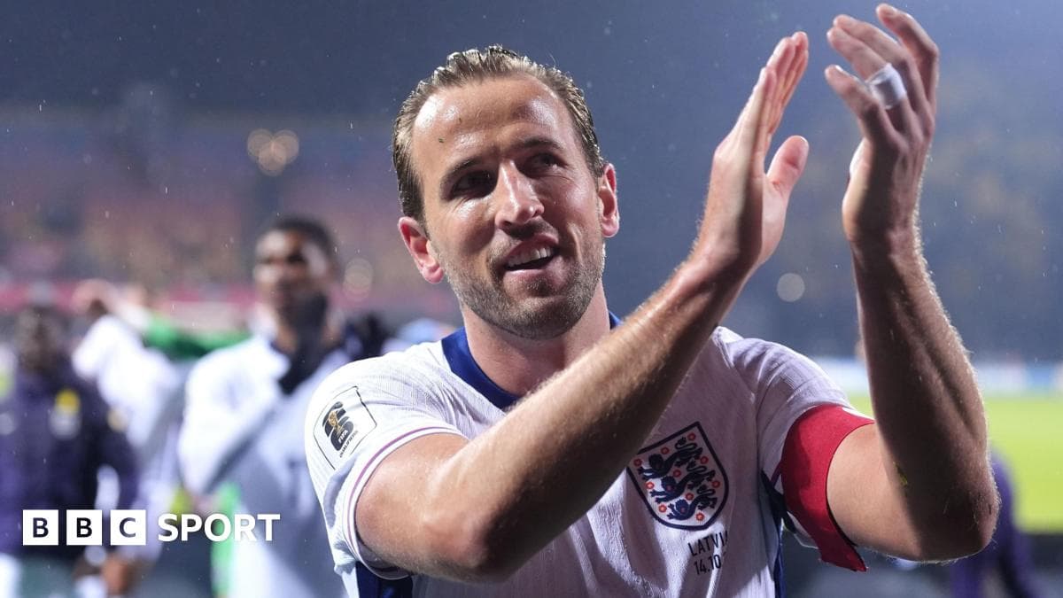Player applauding fans after the match
