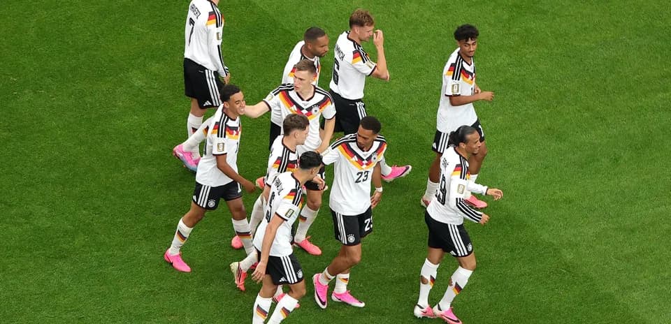 Germany team celebrating on the pitch