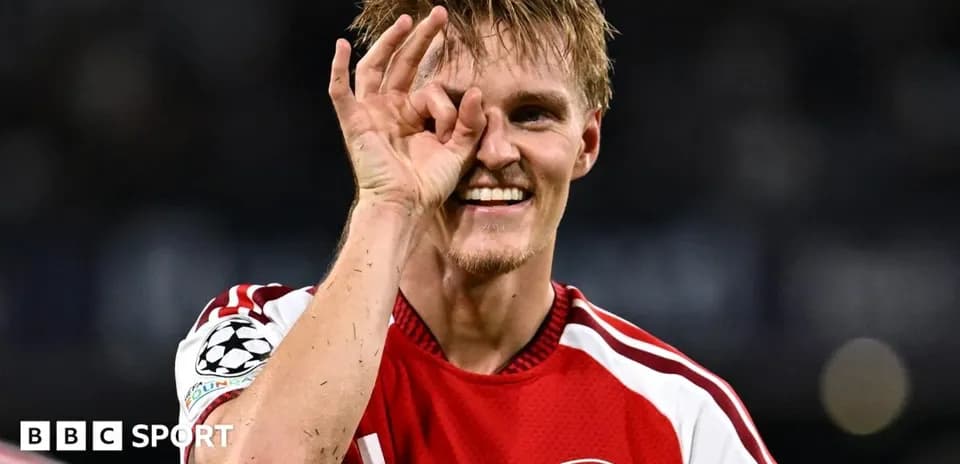 Player celebrating with a hand gesture after match