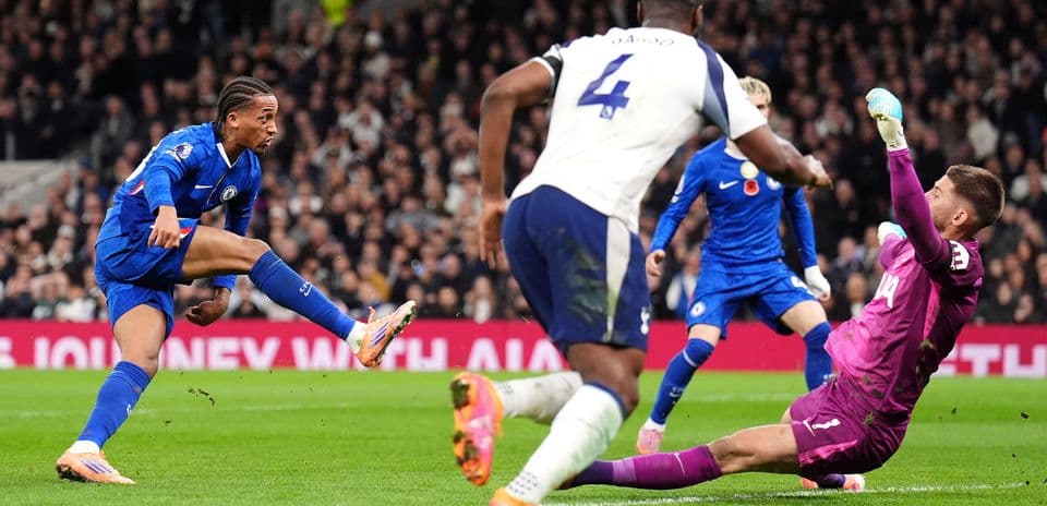 Chelsea player attempting to score against Tottenham