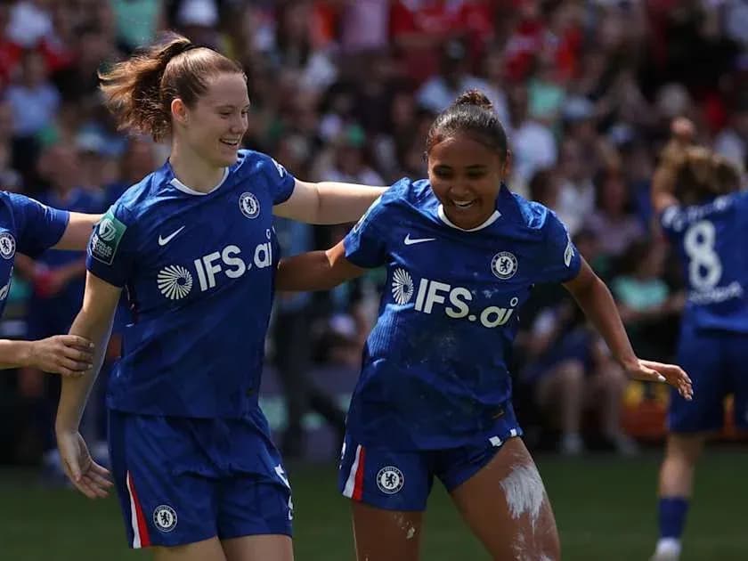 Chelsea players celebrating a goal during match