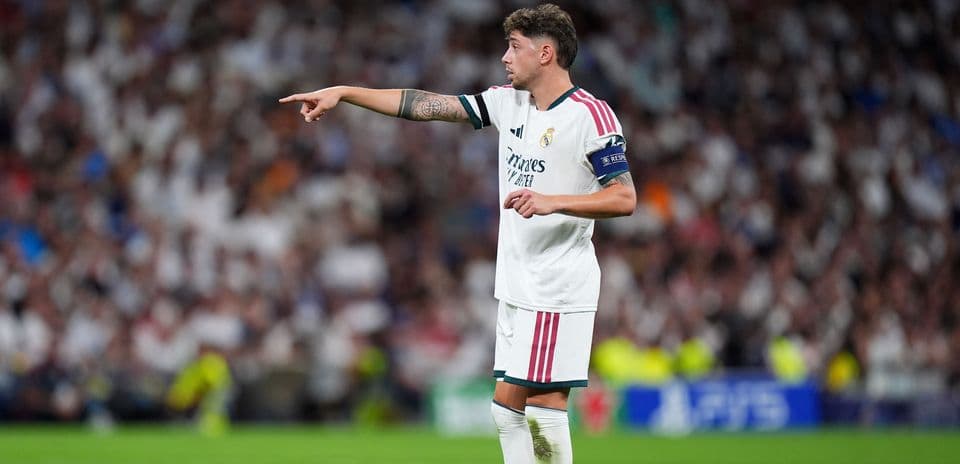 Player gesturing during a match for Real Madrid