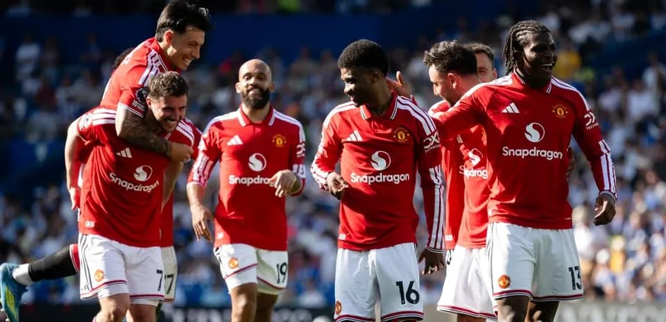 Manchester United players celebrating during a match
