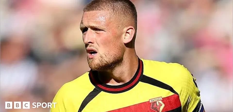 Player wearing Watford jersey during match