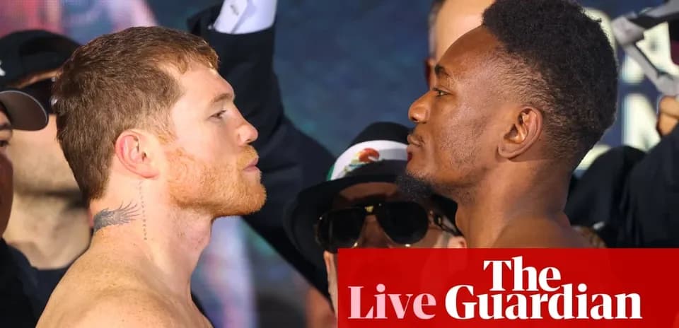 Two boxers facing off at weigh-in event