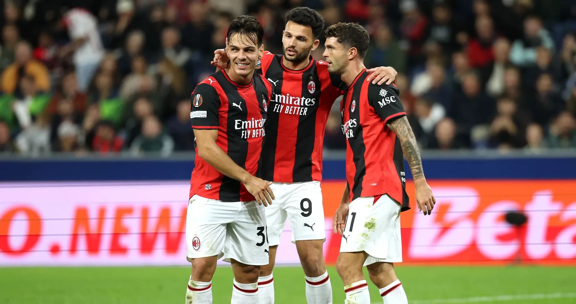 AC Milan players celebrating after a goal