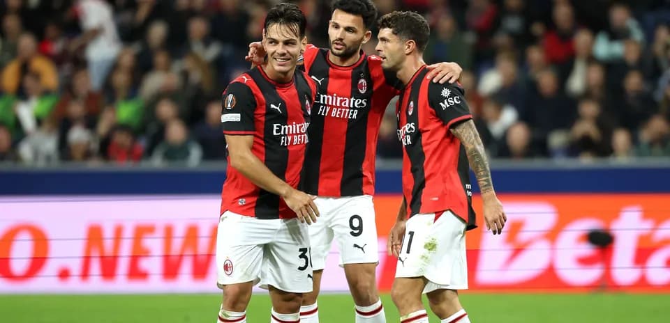 AC Milan players celebrating after a goal